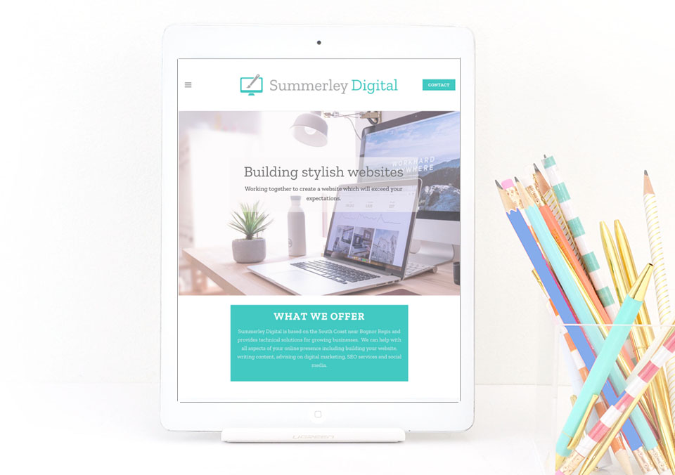 iPad showing the Summerley Digital homescreen with a box of pencils